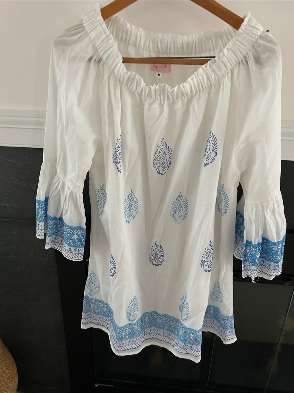 White Off-Shoulder Mini Dress with Blue Embroidered Print.